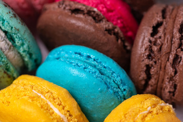 Close-up French macaroons on white background. Flat lay. Top view. Selective focus