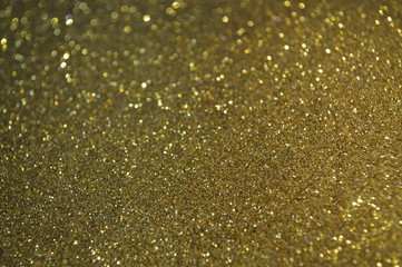 The bokeh of the glitter surface that reflects with neon light.