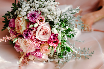 flowers, bridal bouquet closeup, Florist with her work, gerbera, tulips and mix of summer flowers bouquet for the wedding