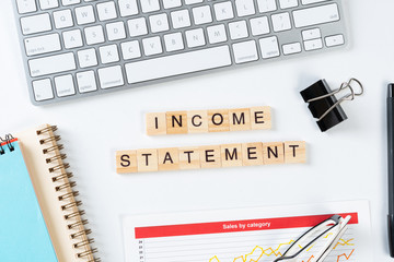 Income statement concept with letters