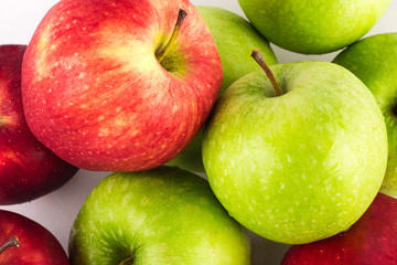 green apple and red apple close up on white background fruit agriculture food isolated