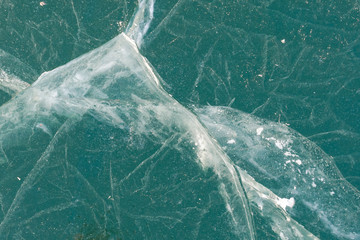 Ice texture, background. Top view of empty frozen lake with copy space