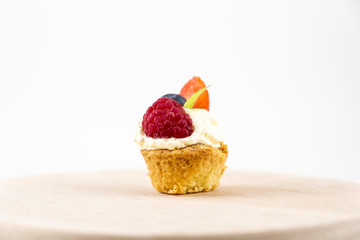 Mignon dessert with fruit cream and chocolate