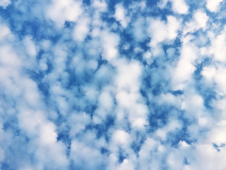 Texture of blue sky with white clouds. Background