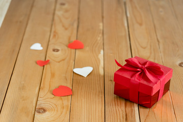 Accessories of decorations valentine's day background concept.Essential items colorful love shape with gift box on modern rustic brown wooden & grey cement.blank space for mock up design text.