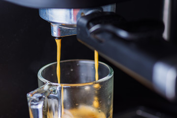 Espresso coffee from a drip-glass coffee machine.