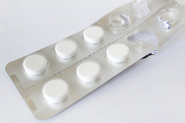 close up pills tablets in blister isolated on white