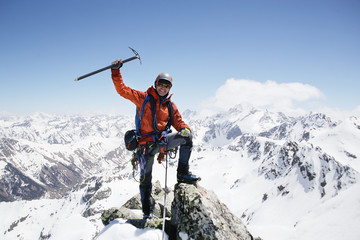 alpinism in the snowy mountains - obrazy, fototapety, plakaty