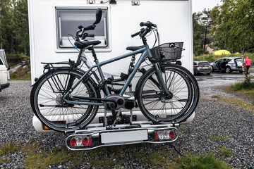 Fototapeta na wymiar bicycles attached to the camper