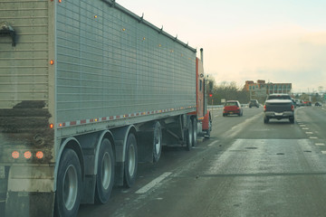 Obraz na płótnie Canvas An american truck on highway.