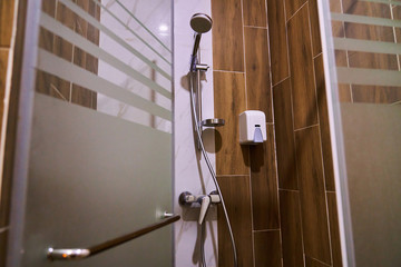 Shower in the spa or in the gym, shower with frosted glass doors