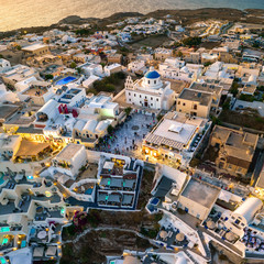 Fototapeta premium oia santorini central square church Panagia Platsani in greece european sea resort beautiful cyclades island
