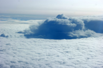 Fototapeta premium Volcano peeking through the clouds, a majestic and serene natural wonder.