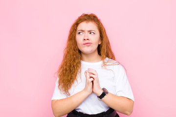 young red head woman scheming and conspiring, thinking devious tricks and cheats, cunning and...