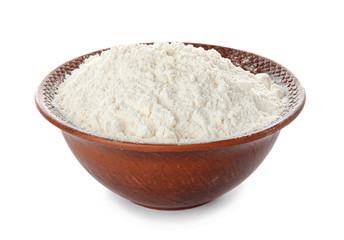 Bowl with flour on white background