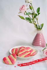 Homemade striped heart cookies / Valentines day background