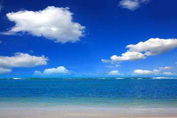 Caribbean sea and clouds sky. Travel background.