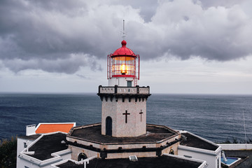 Fototapeta na wymiar Lighthouse Arnel in the Azores, Portugal.