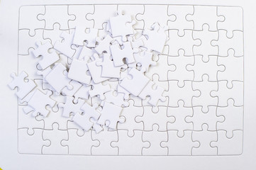 White jigsaw puzzles put together Business idea