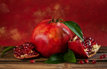 Close up of Freash Pomegranate on the Red Lush Lava background