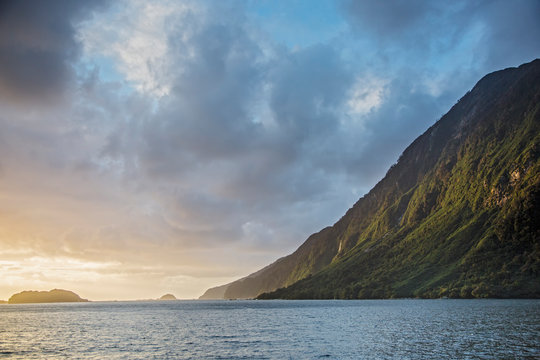 Tranquil ocean and cliff, Doubtful Sound, South Island New Zealand