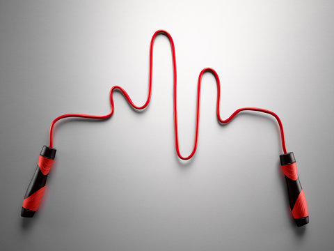 Red jump rope forming pulse trace on gray background