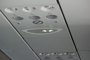 flight passenger panel above the seat
