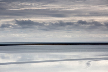 Tranquil, blue and gray clouds and ocean, Lagoon, Hofn, Iceland