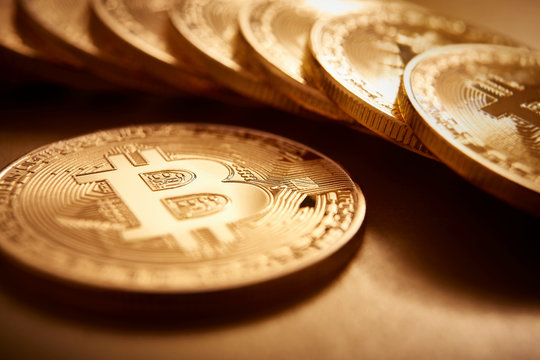 Golden Bitcoins - Powered by Adobe