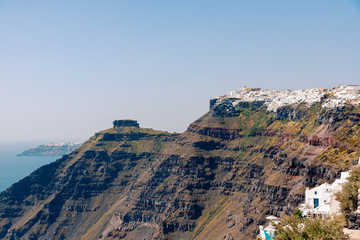 Panoramic view on the Fira capital of Santorini at summer sun light
