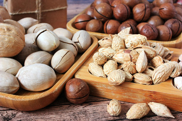 Nuts on a wooden plate