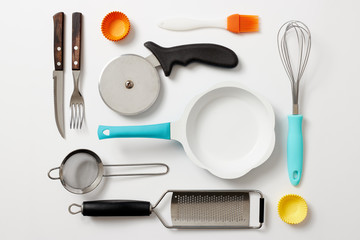 Various kitchen utensils on a white background