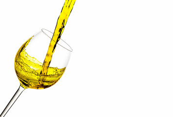 pouring red wine into glass isolated on white