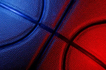 Gordijnen Closeup detail of basketball ball texture background. Blue neon Banner Art concept © Augustas Cetkauskas