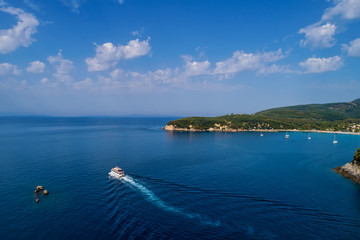 Aerial cityscape view of the coastal city of Parga, Greece during the Summer