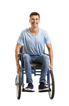 Handicapped Young Man In Wheelchair On White Background