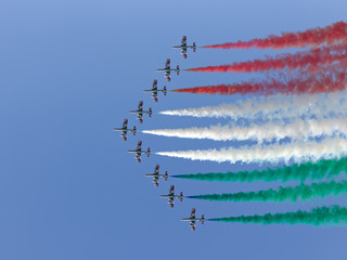 Italian Air Force aerobatic demonstration team Frecce Tricolori flying display during air show Falcon Wings 2019 at Siauliai Air Base