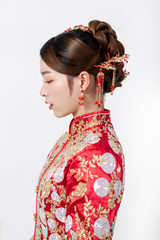 Asian bride in red chinese costume wedding costume