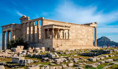 The Erechtheion (or Erechtheum), an ancient Greek temple on the north side of the Acropolis of...