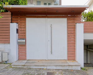 Contemporary house entrance white door, Athens Greece
