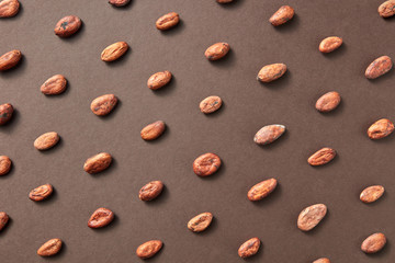 Creative background from cocoa beans.