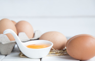 Fototapeta na wymiar Eggs chicken on white wood background
