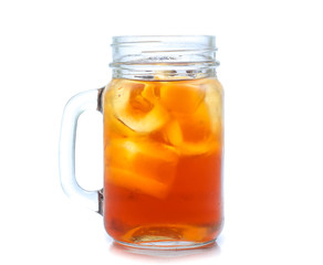 jar glass of iced tea with lemons  isolated on a white background