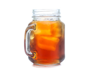 jar glass of iced tea with lemons  isolated on a white background