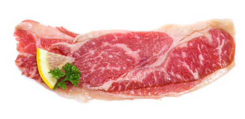 Fresh raw beef meat slices isolated over white background