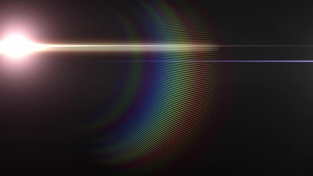 Lens flare light and bright glow and prism effect over black background.
