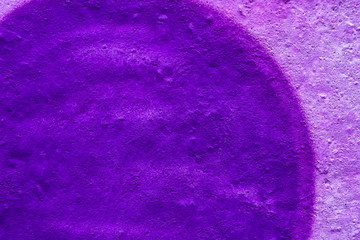 Beautiful street art graffiti background with copyspace. Abstract geometric spray drawing fashion colors on the brick wall. Urban Culture detailed close up texture purple, crimson ,blue picture
