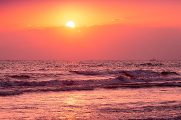 Obraz premium Orange sunset over the sea. Sea landscape in the evening