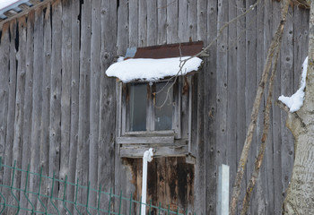 wooden house detail in the snow
