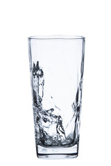 pouring water on a glass on white background clipping path